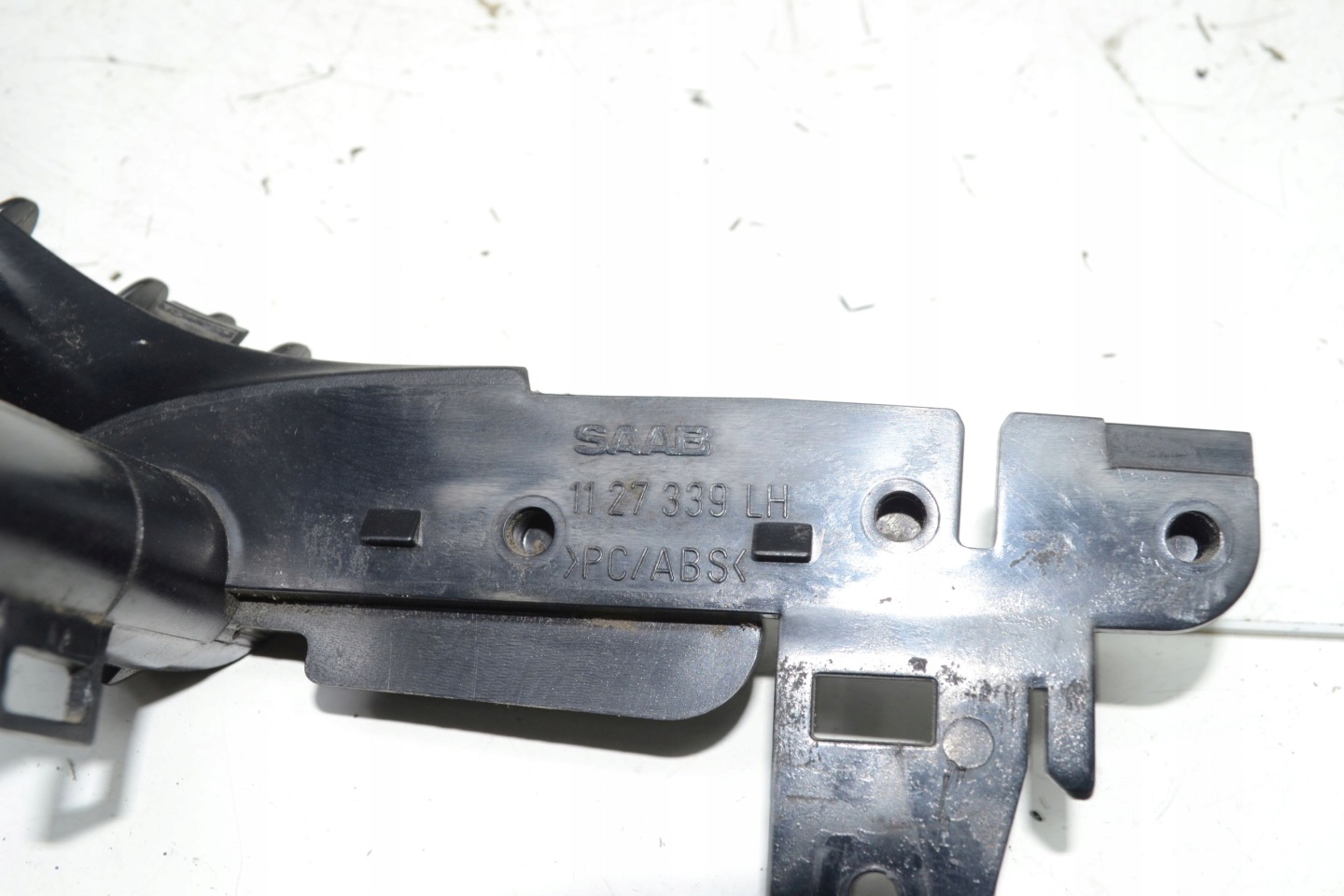 handle bracket door left front SAAB 93 9-3 02-11r 1127339