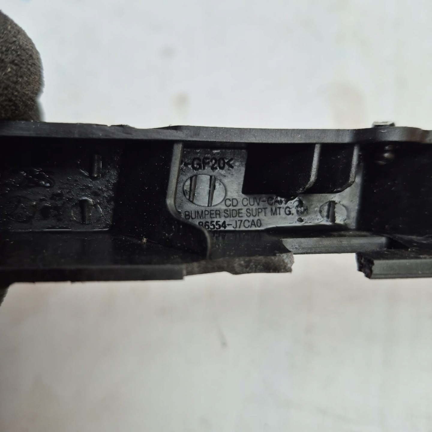 KIA X-CEED 17r. -> support holder of a bumper lights right front 86554-J7CA0