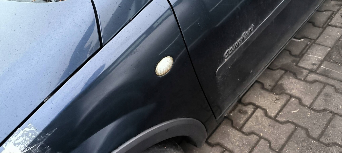 blatník levý předek Z36U OPEL CORSA
