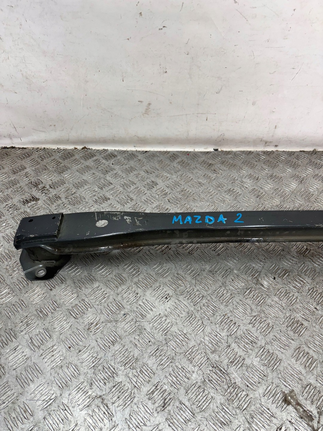 TRAVERSA paraurti posteriore MAZDA 2 DE 07