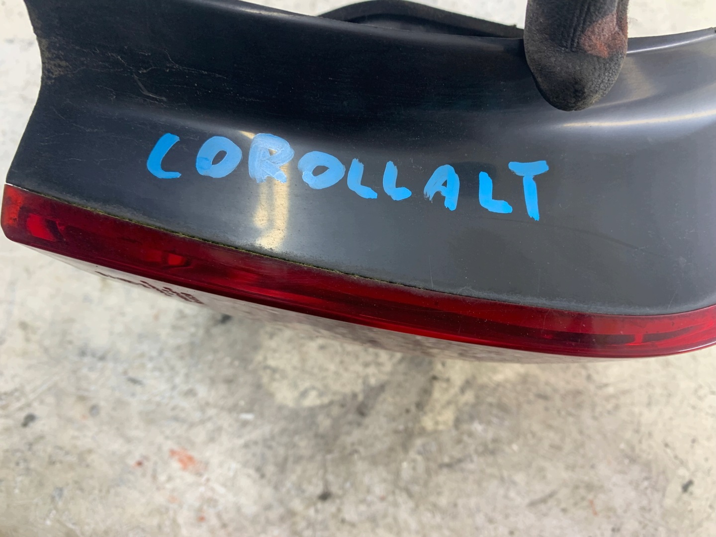 TOYOTA COROLLA E12 far lijeva stražnji dio