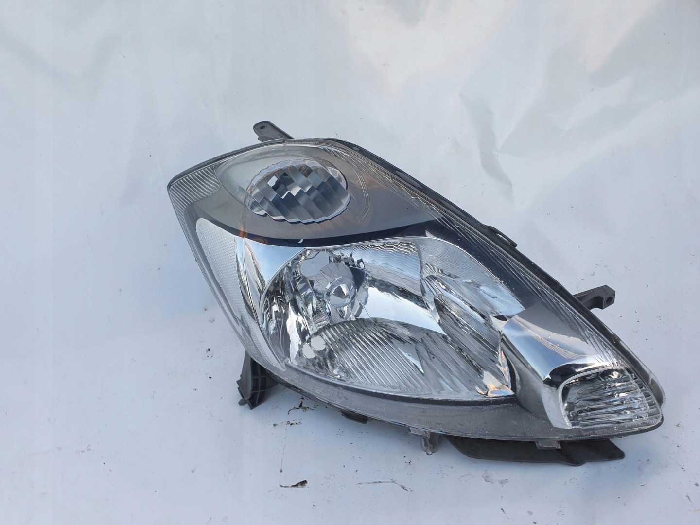 DAIHATSU SIRION SUBARU JUSTY 08- light left front
