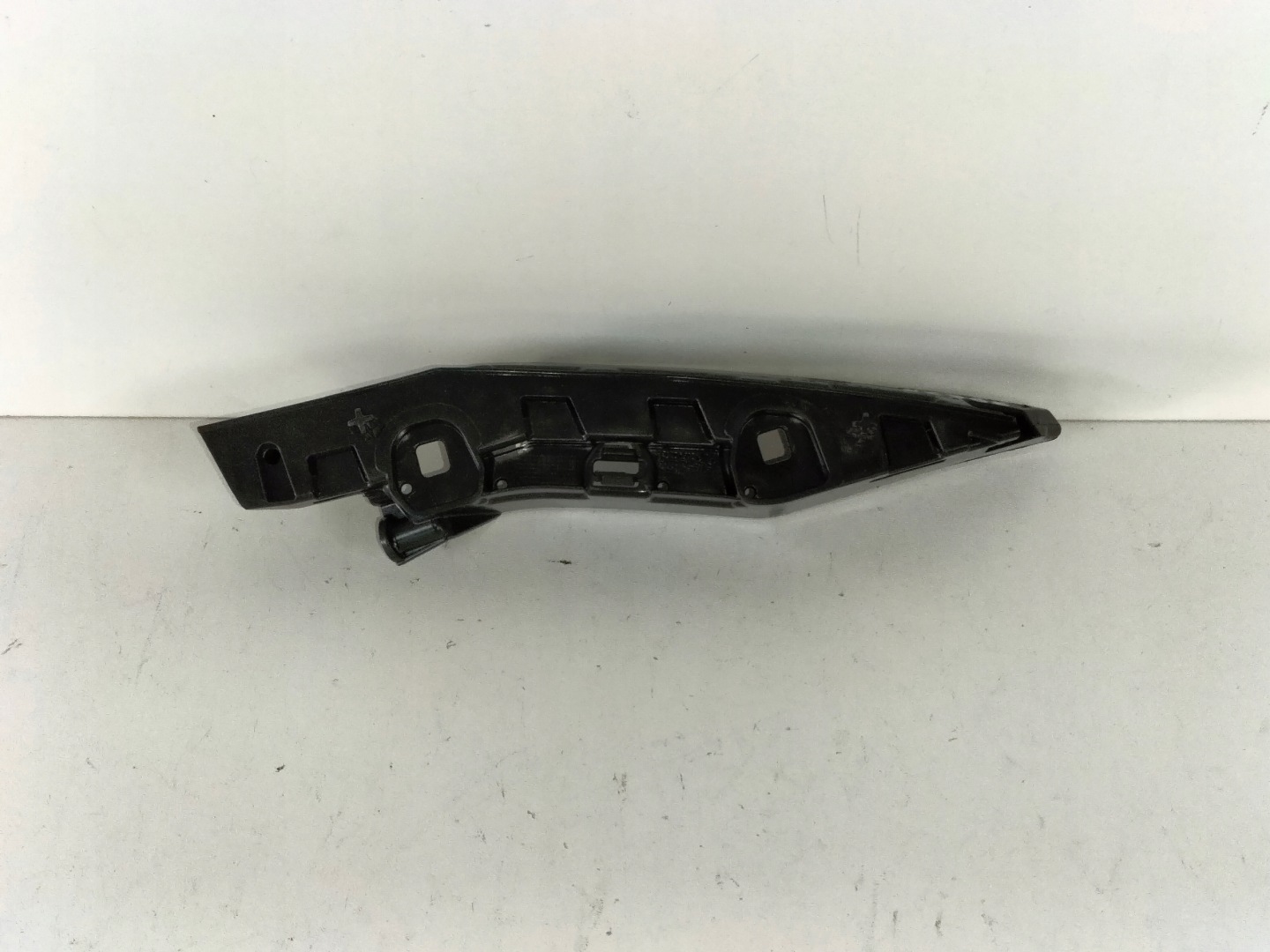 support holder of a bumper front left SKODA SCALA 19