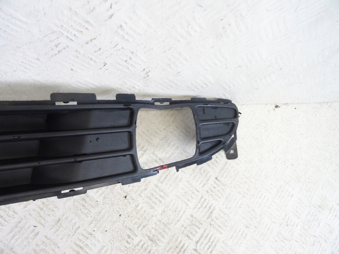 grid of a bumper front front KIA RIO III 3 86522-1G010