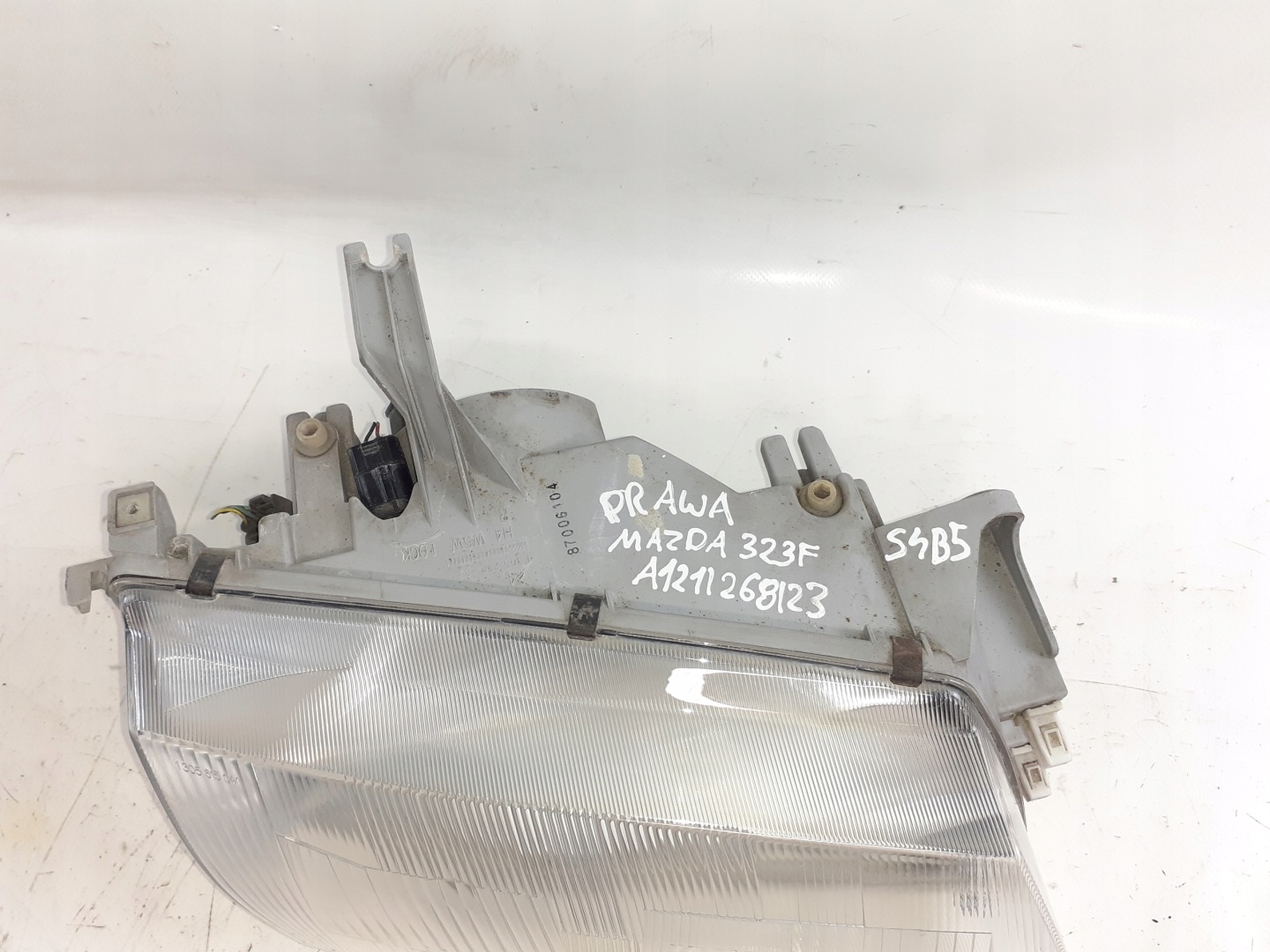 light right front Mazda 323F