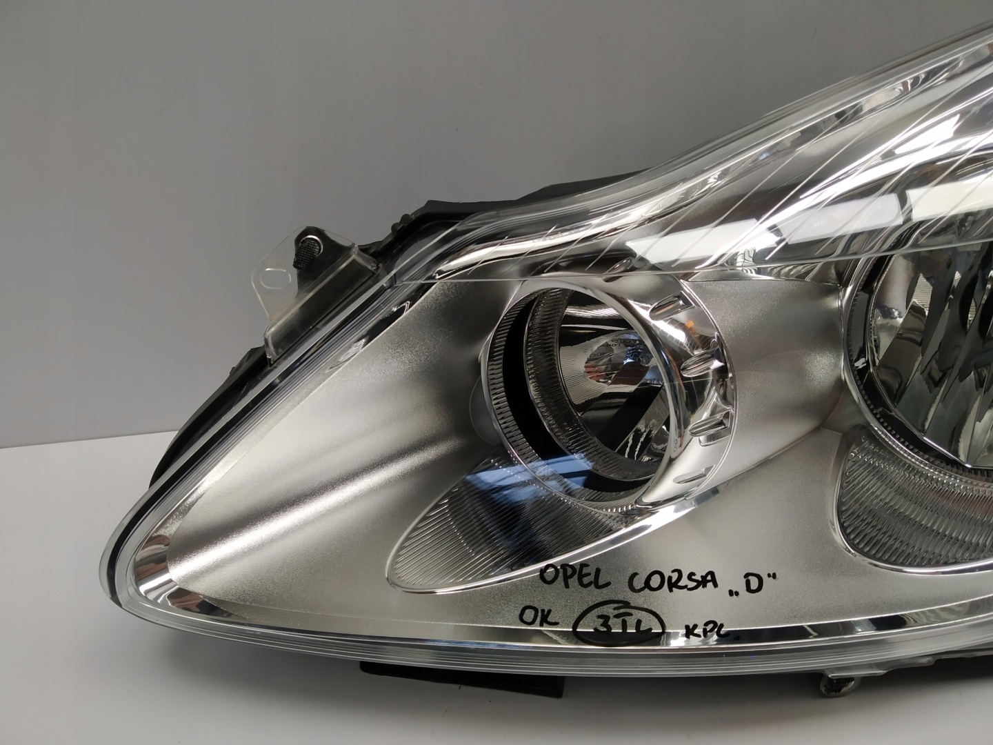 Corsa D reflektor light front left before lift OM 13186381