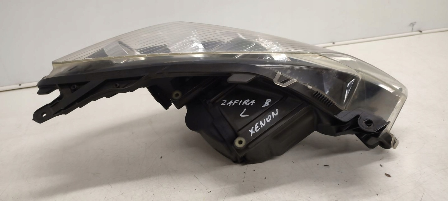 light front front left xenon positioning Opel Astra H