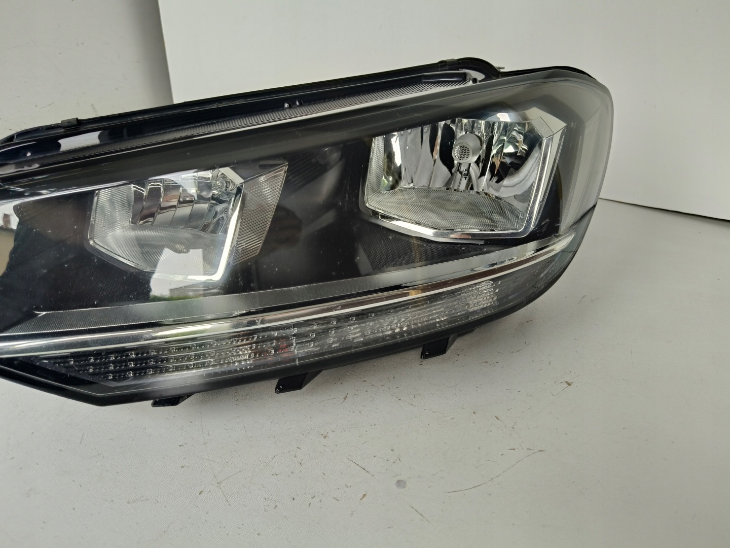 light left REFLEKTOR VW TOURAN 5TA 16