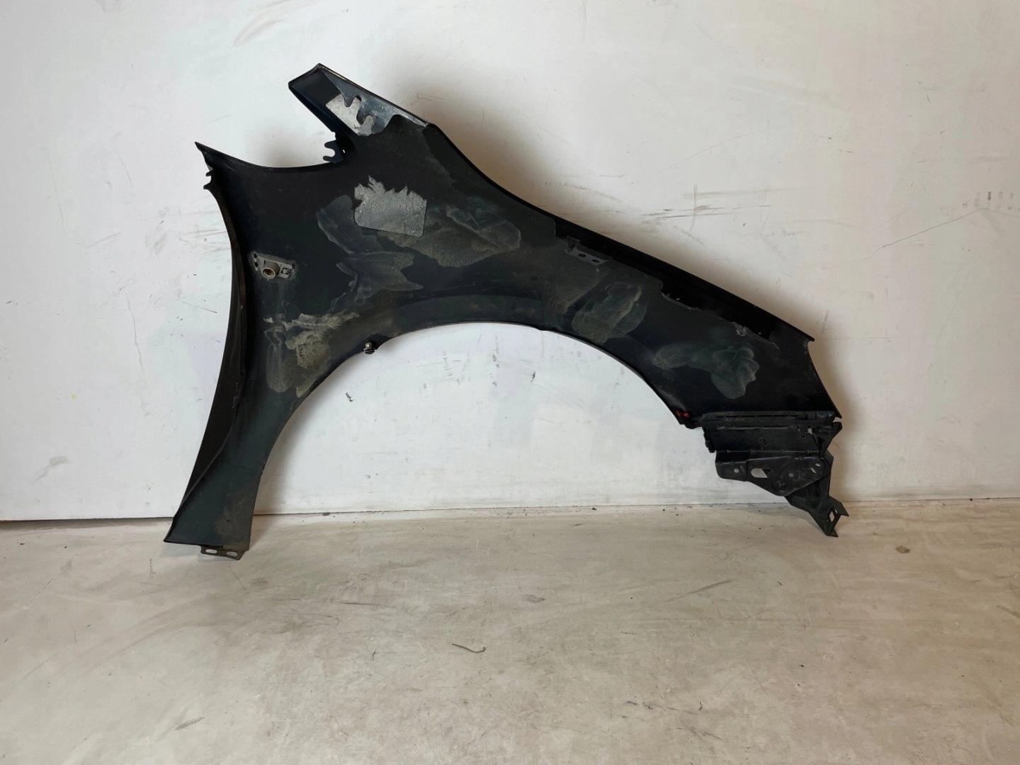 fender front front left Opel Astra IV J black