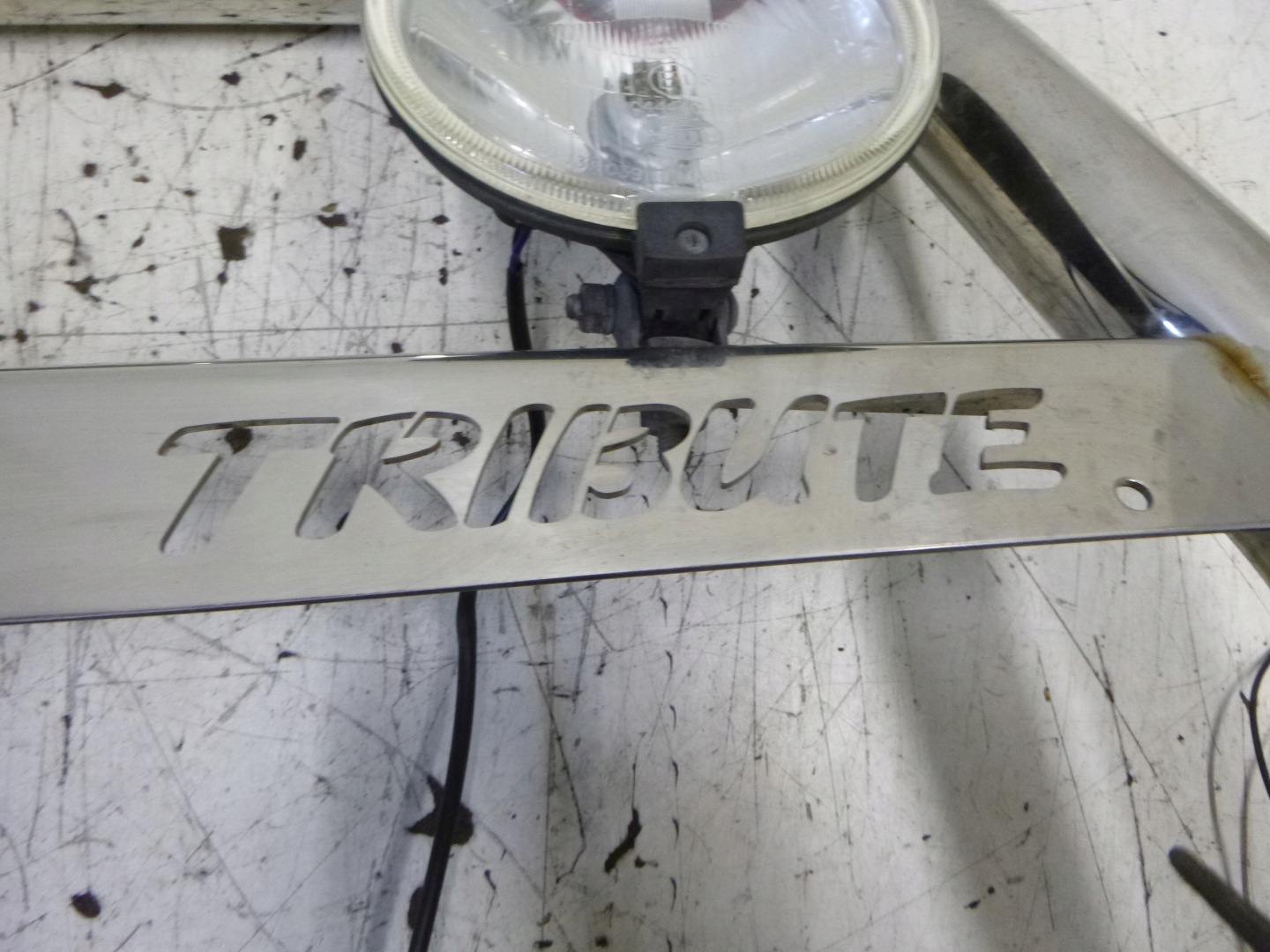 Wysokie orurowanie z grillem Mazda Tribute 2.3 2000-2007