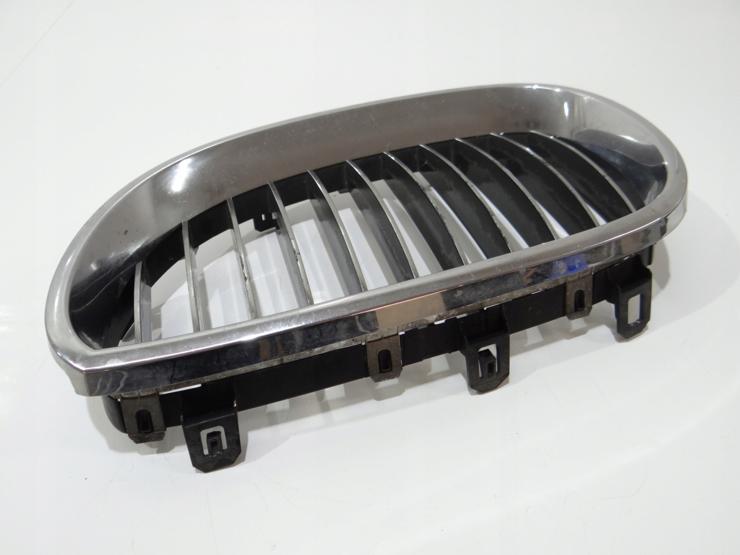 hűtőrács hip pack eleje bal BMW E60 E61 7065701 (4273211)
