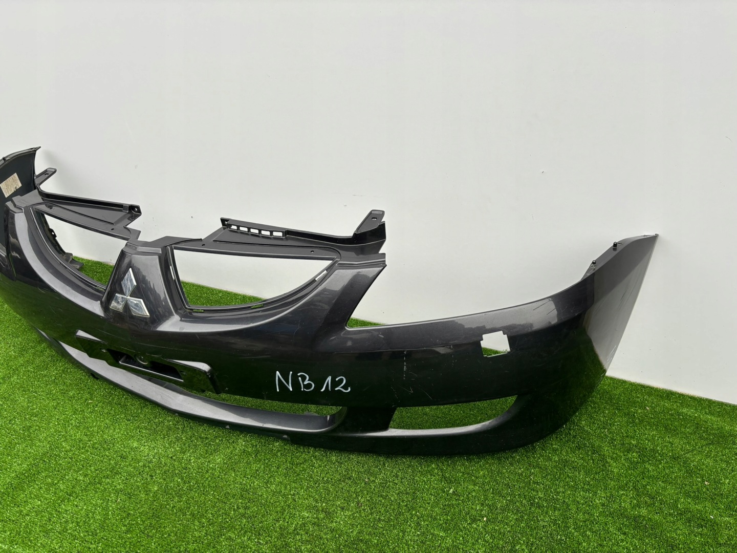 MITSUBISHI LANCER 7 VII 03-07 ROK bumper front below washers MN126451 NB12