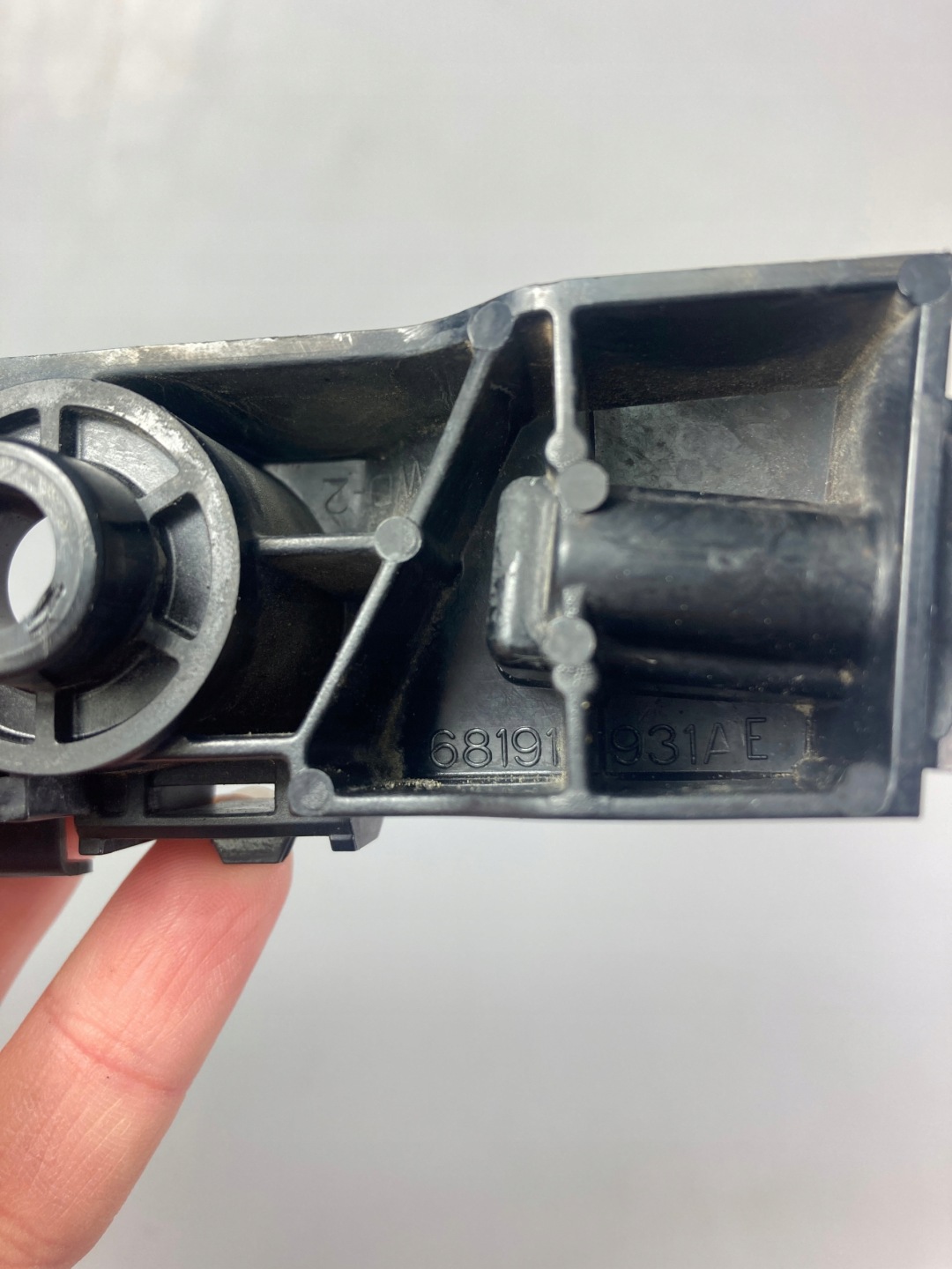 Dodge Durango 2014-26 holder bumper bracket of the front left front