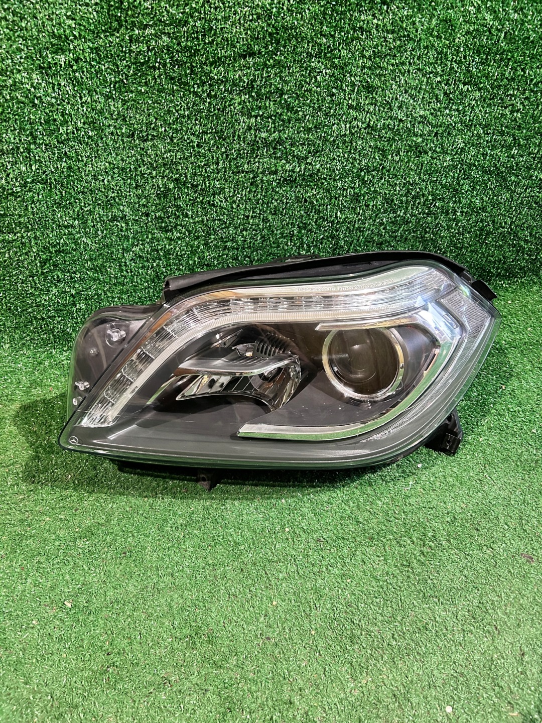 REFLEKTOR links MERCEDES GL KLASA W166 NR.R28