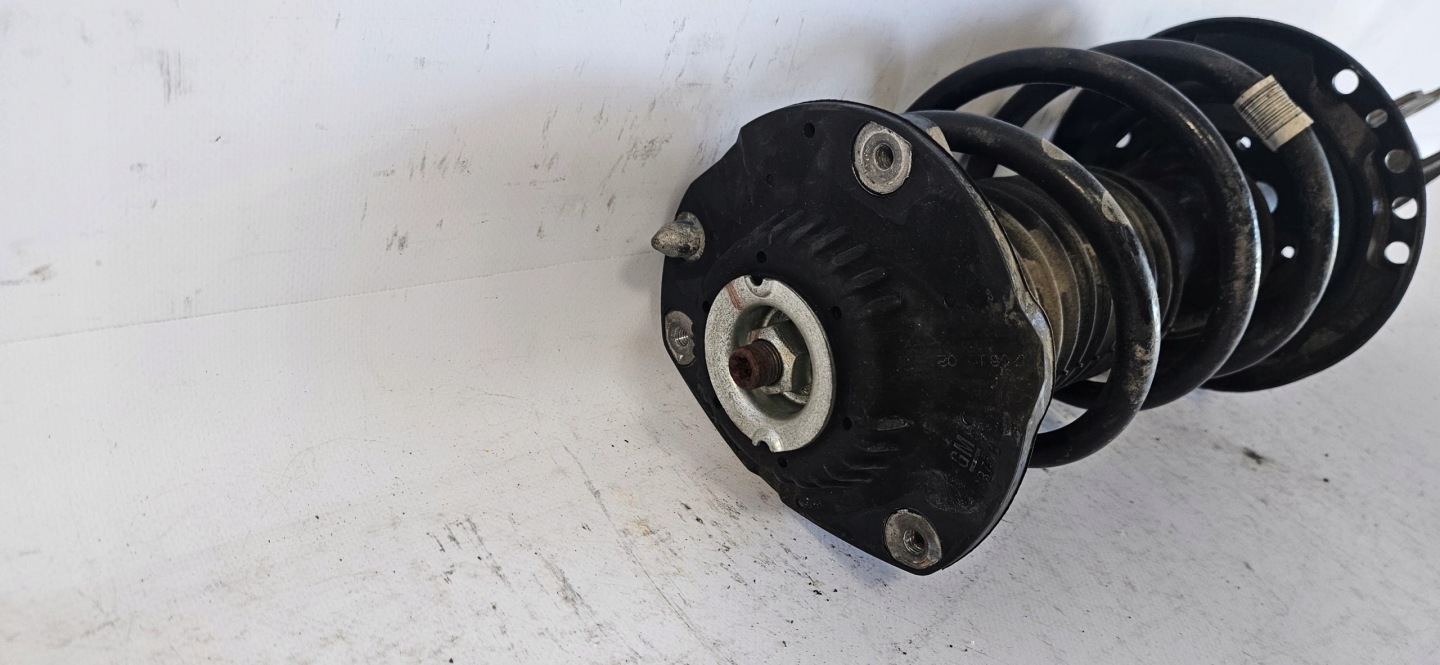 shock absorber left front OPEL ASTRA V K 39039563