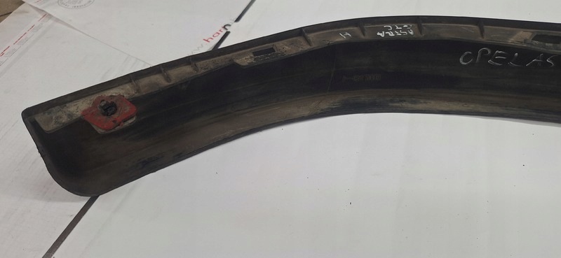 SPOILER of a bumper left front OPEL ASTRA H 13143158