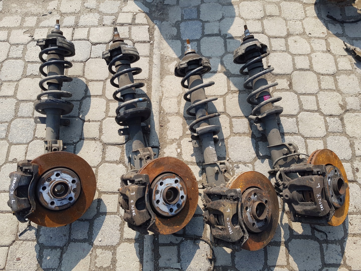 VIVARO TRAFIC III of the pivot swing shock absorber caliper front front left