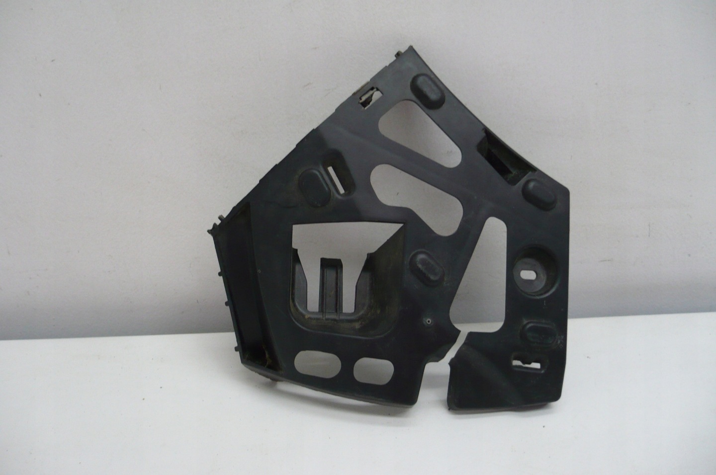 PEUGEOT 207 holder bumper bracket left front 06-12