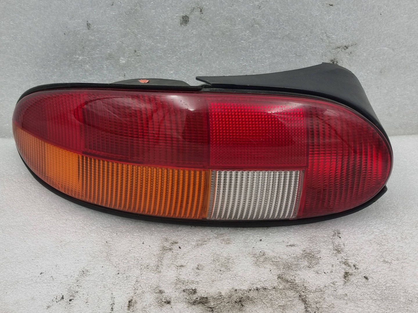 light rear rear part side left Chrysler Stratus and Cabrio 5303283AB