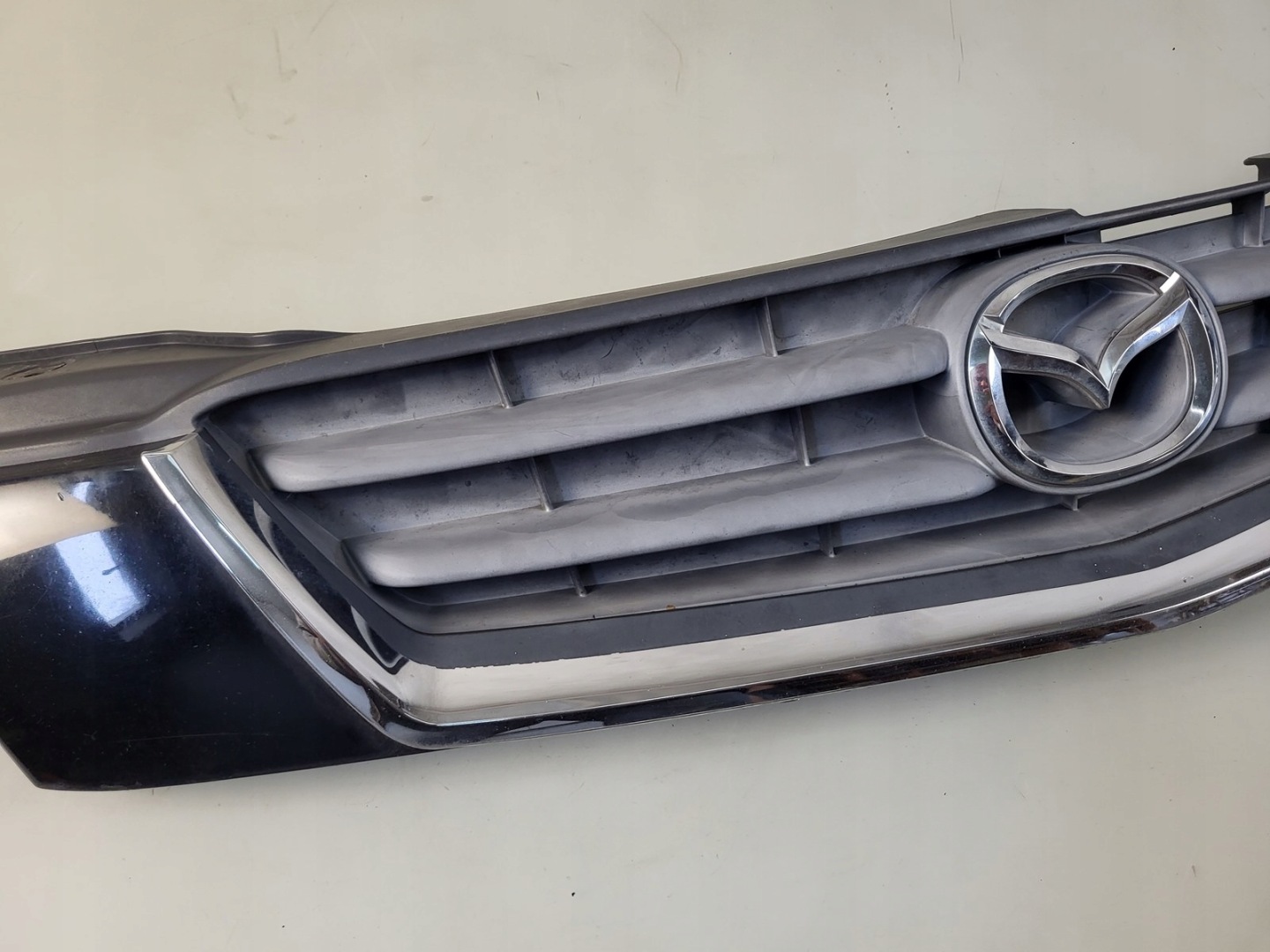 grille radiator grill A3F MAZDA DEMIO DC3550712