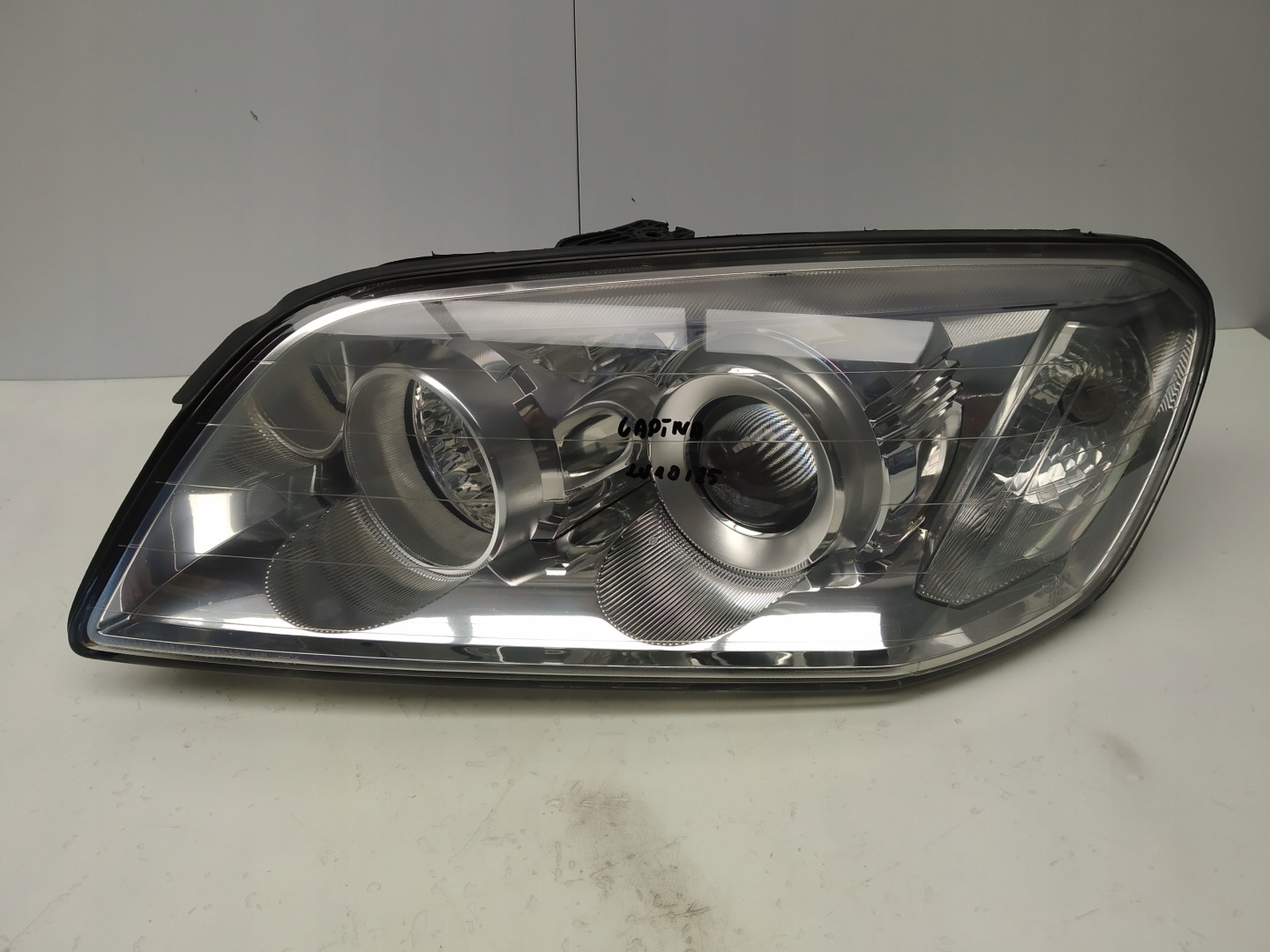 06-10r Chevrolet Captiva reflektor light front left 00015486 before lift
