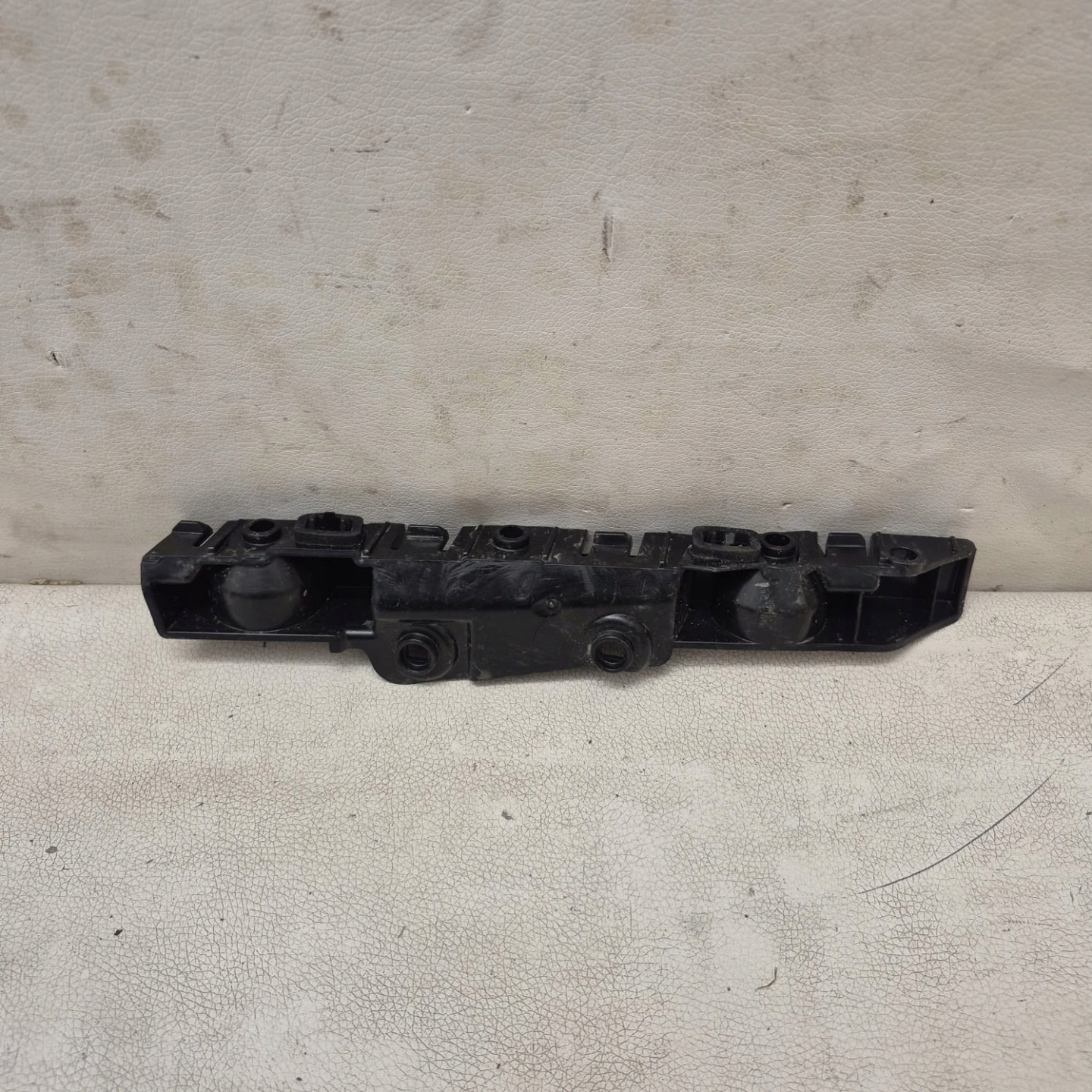 DACIA SANDERO III 3 20-> bracket holder support left rear part
