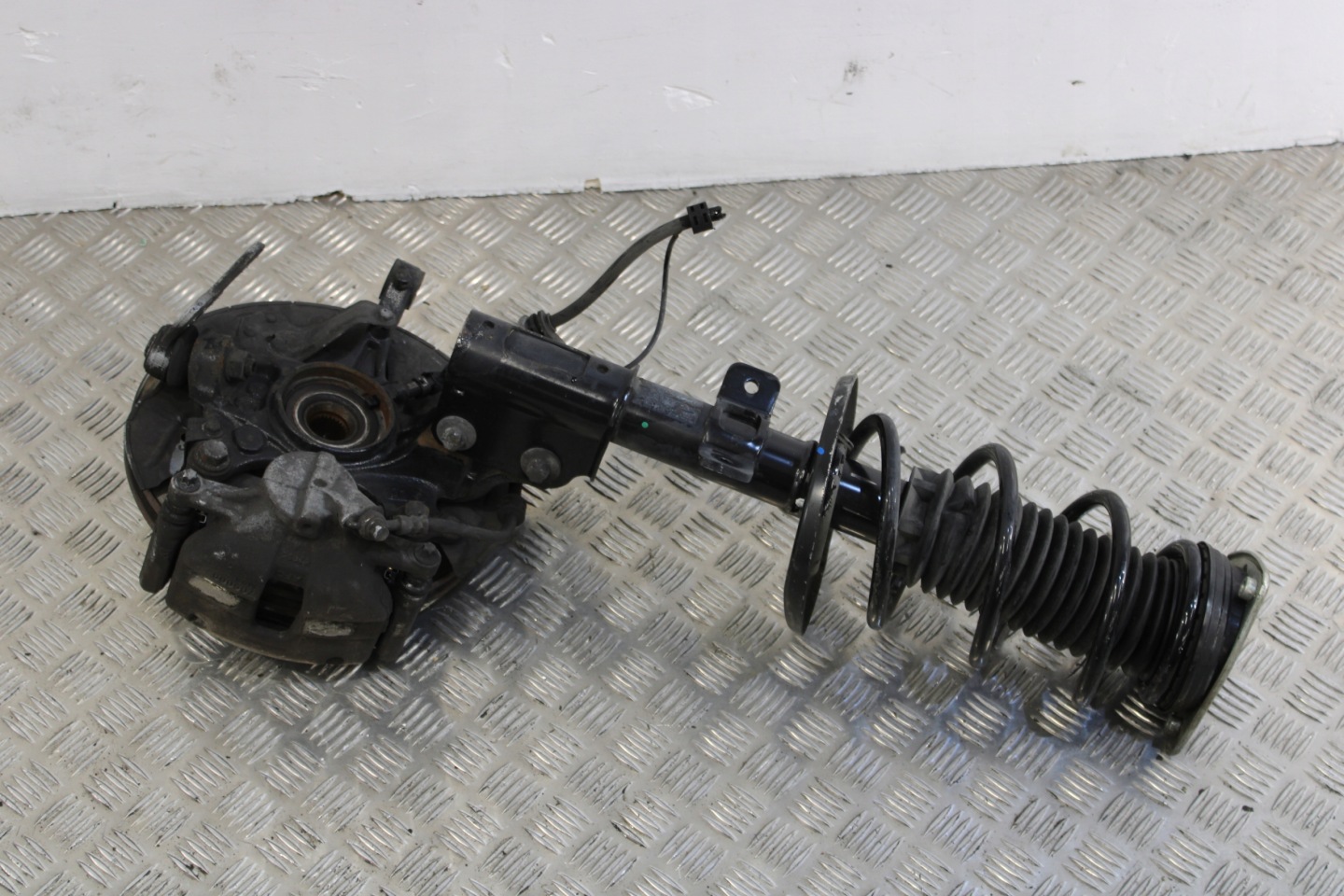 swing McPherson shock absorber left front OPEL COMBO E 1,6 CDTI