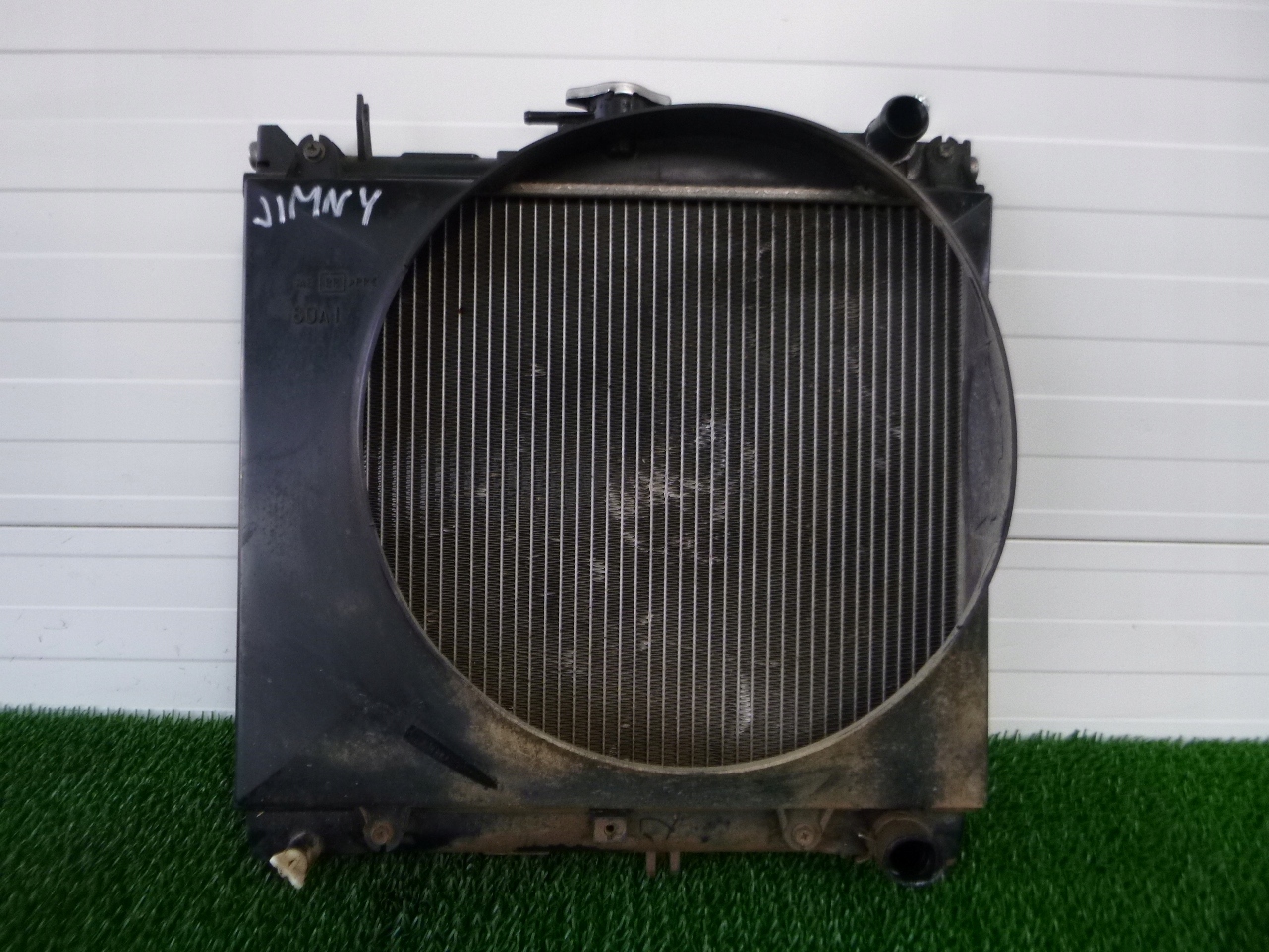 SUZUKI JIIMNY III 1.3 SOHC chladič vody obal