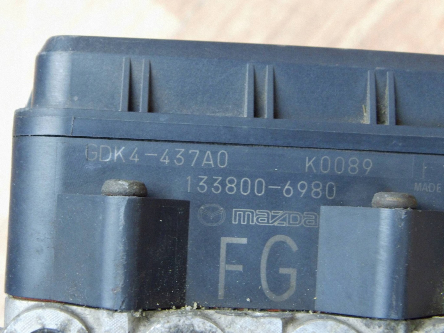 Mazda 6 GH pump ABS GDK4437A0 133800-6980
