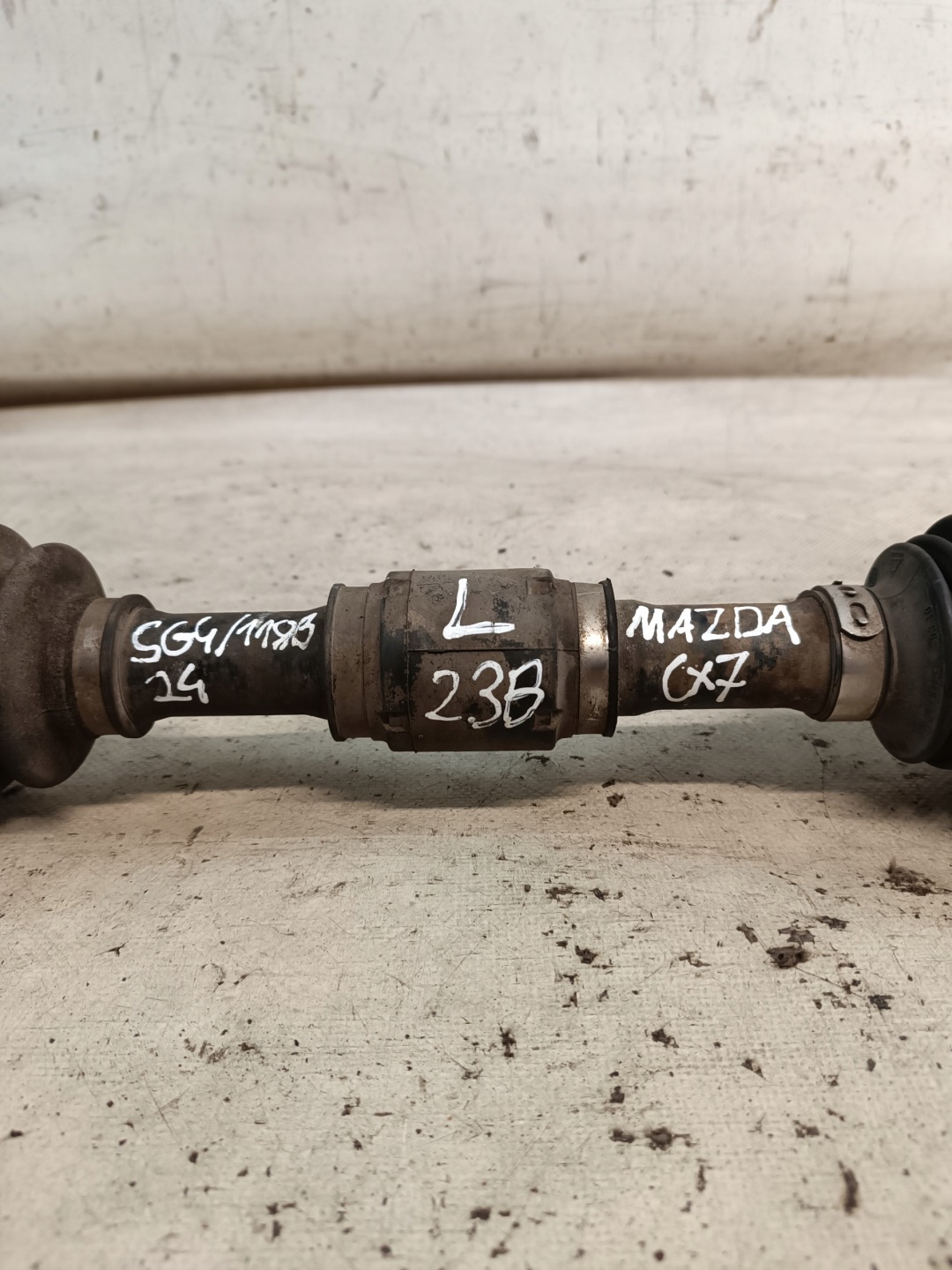 Mazda CX-7 semi-axis left front manual 4X4 2007r 2.3B