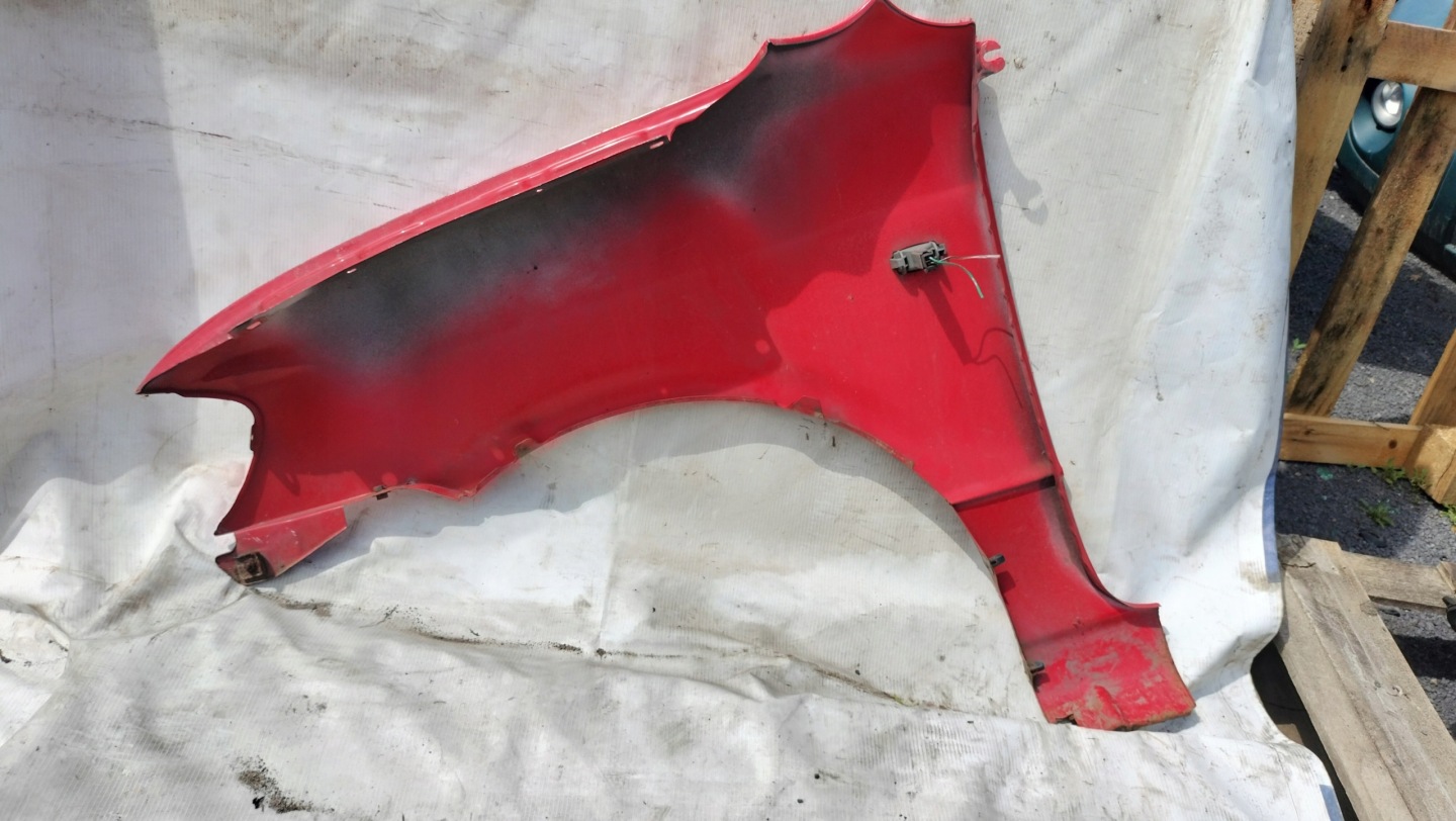 DAIHATSU CUORE VI parafango destra rosso