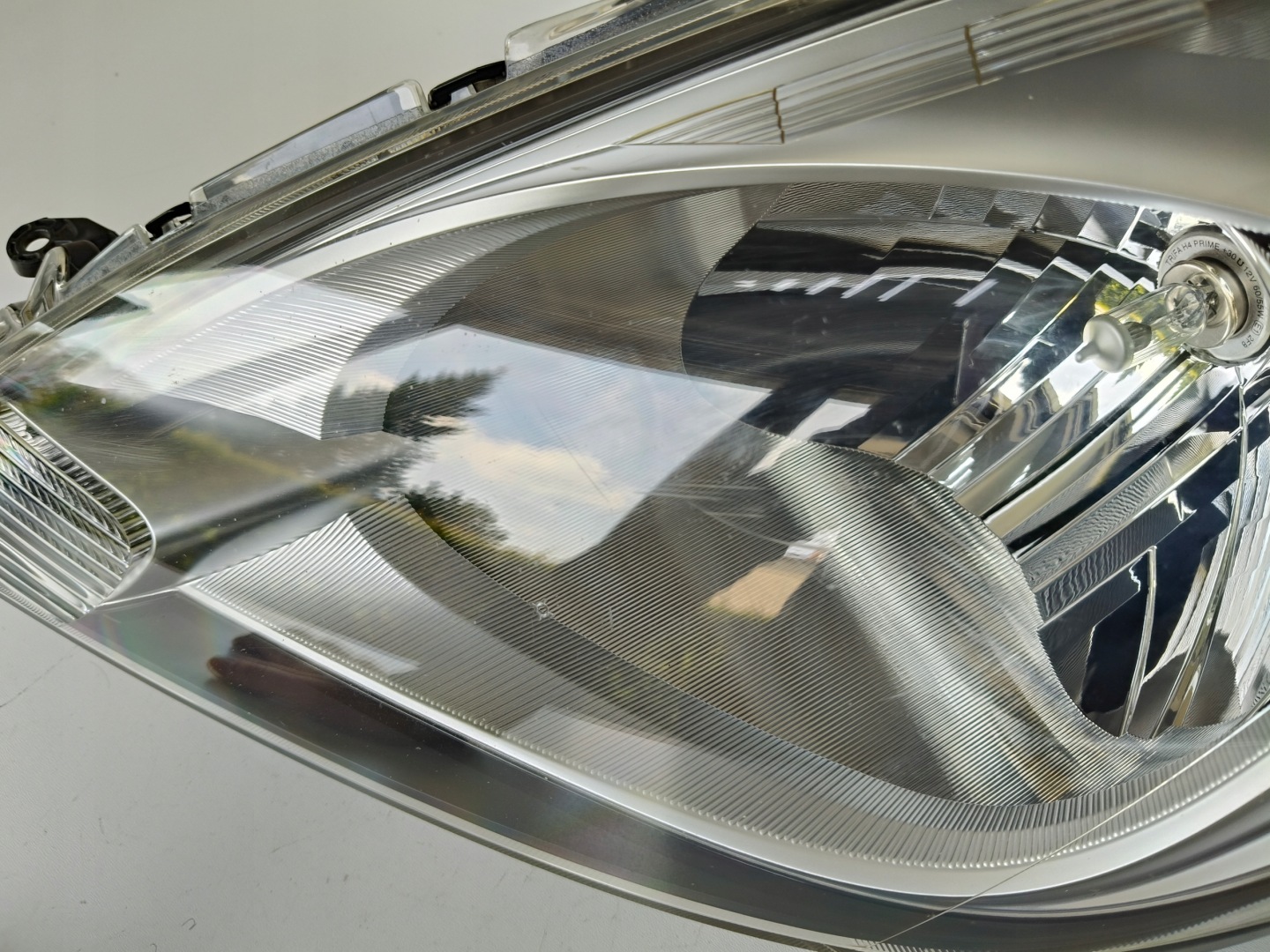 light left REFLEKTOR HONDA JAZZ III 11- LIFT