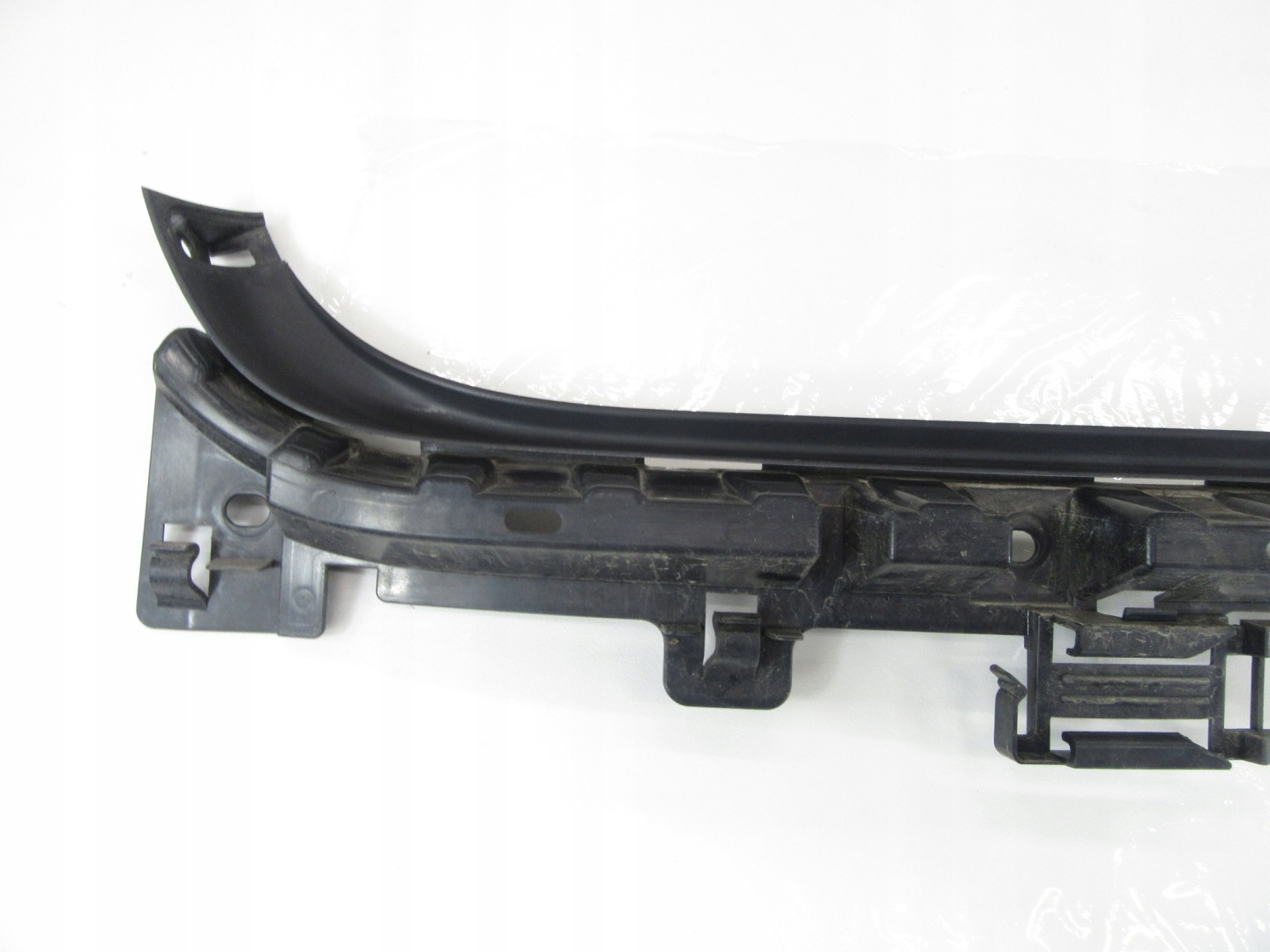 console bracket support holder of a bumper rear part BMW e90 sedan