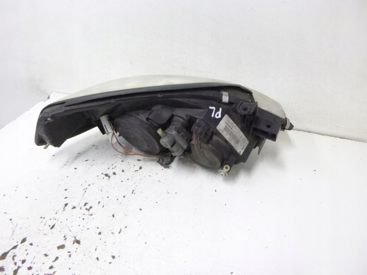 light front Nissan Primera P12 2002r. HELLA 1EJ 238 010-01