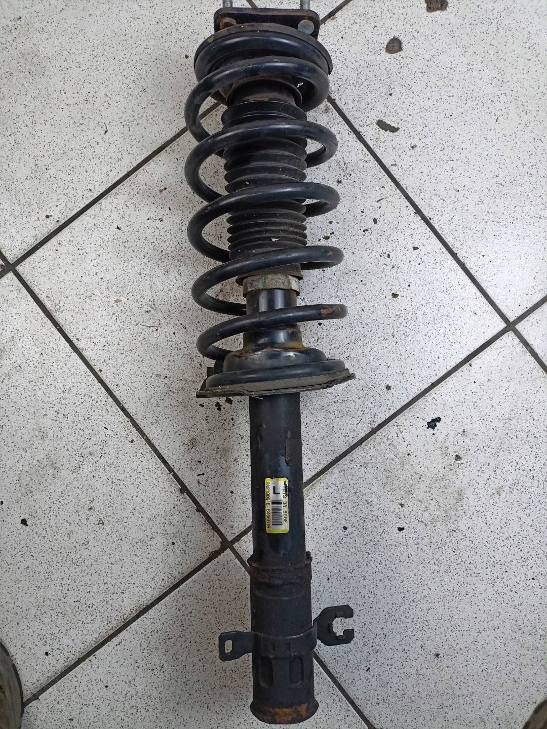 shock absorber front left side Mazda CX-9 facelift 2009 TD13-34900E