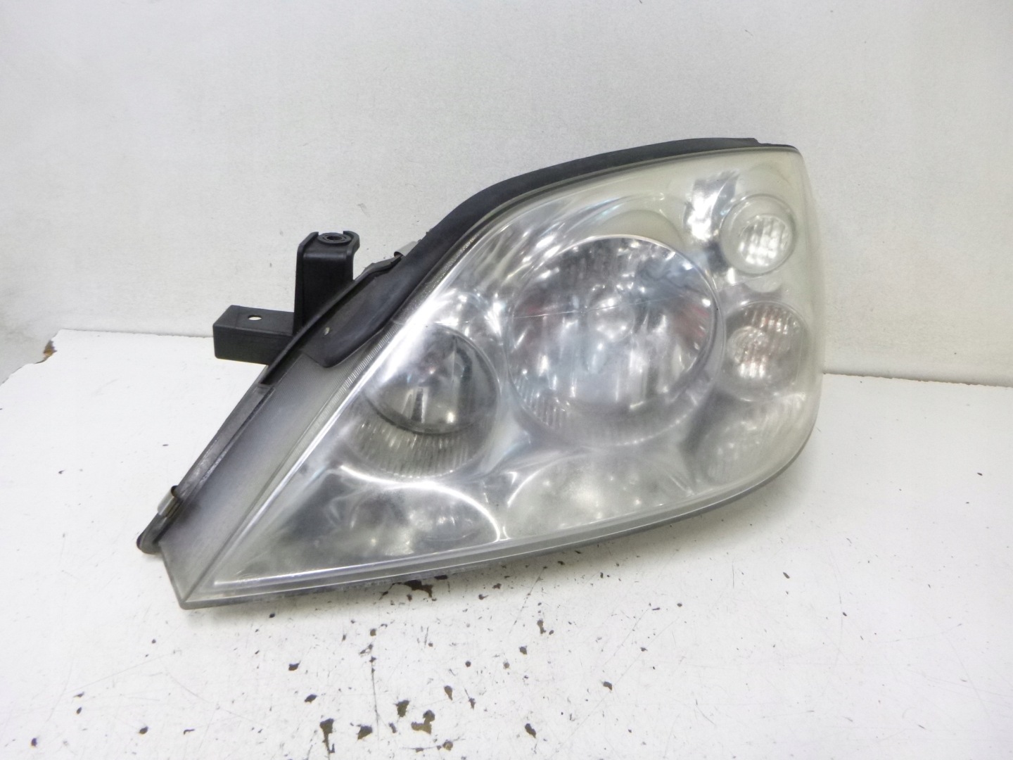 light front Nissan Primera P12 2002r. HELLA 1EJ 238 010-01
