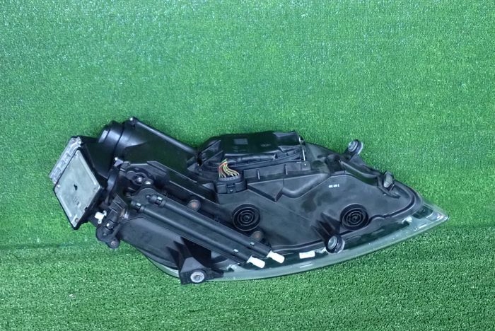 VW PHAETON BI XENON LIFT 07-10 reflektor left light left