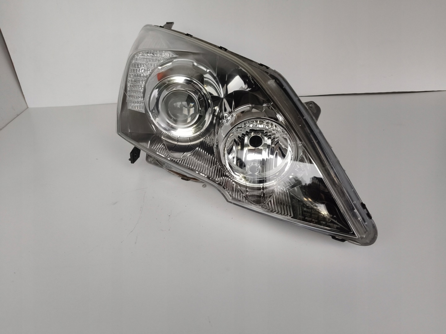 light right REFLEKTOR HONDA CRV III 06