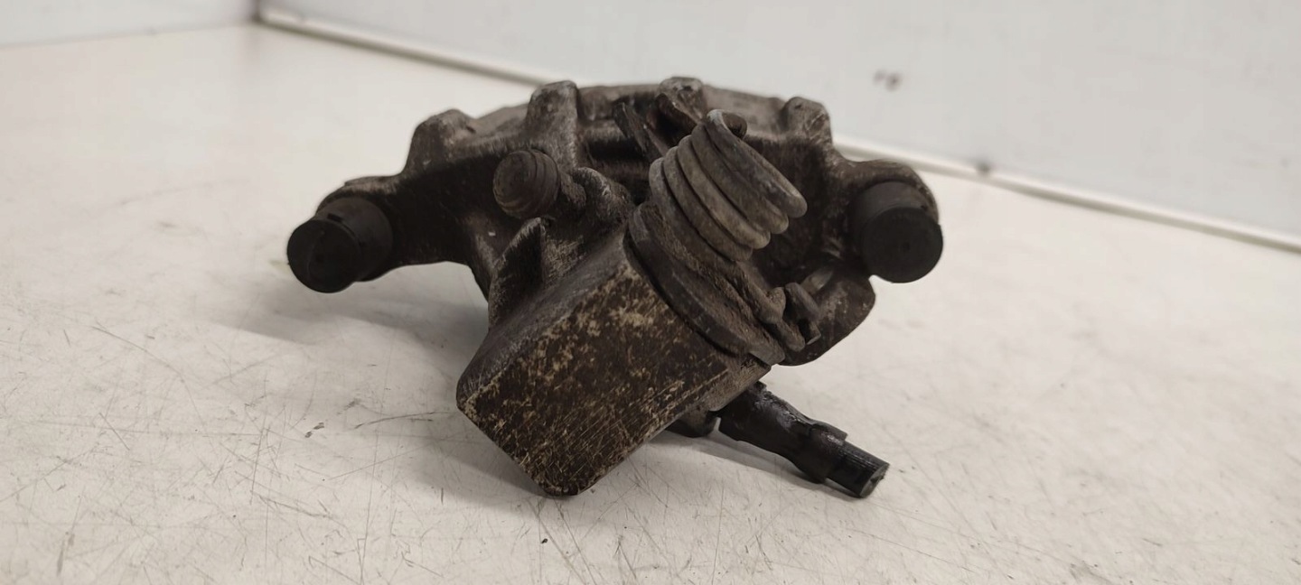 caliper rear part rear left Ford Focus MK3 1,6 TDCI
