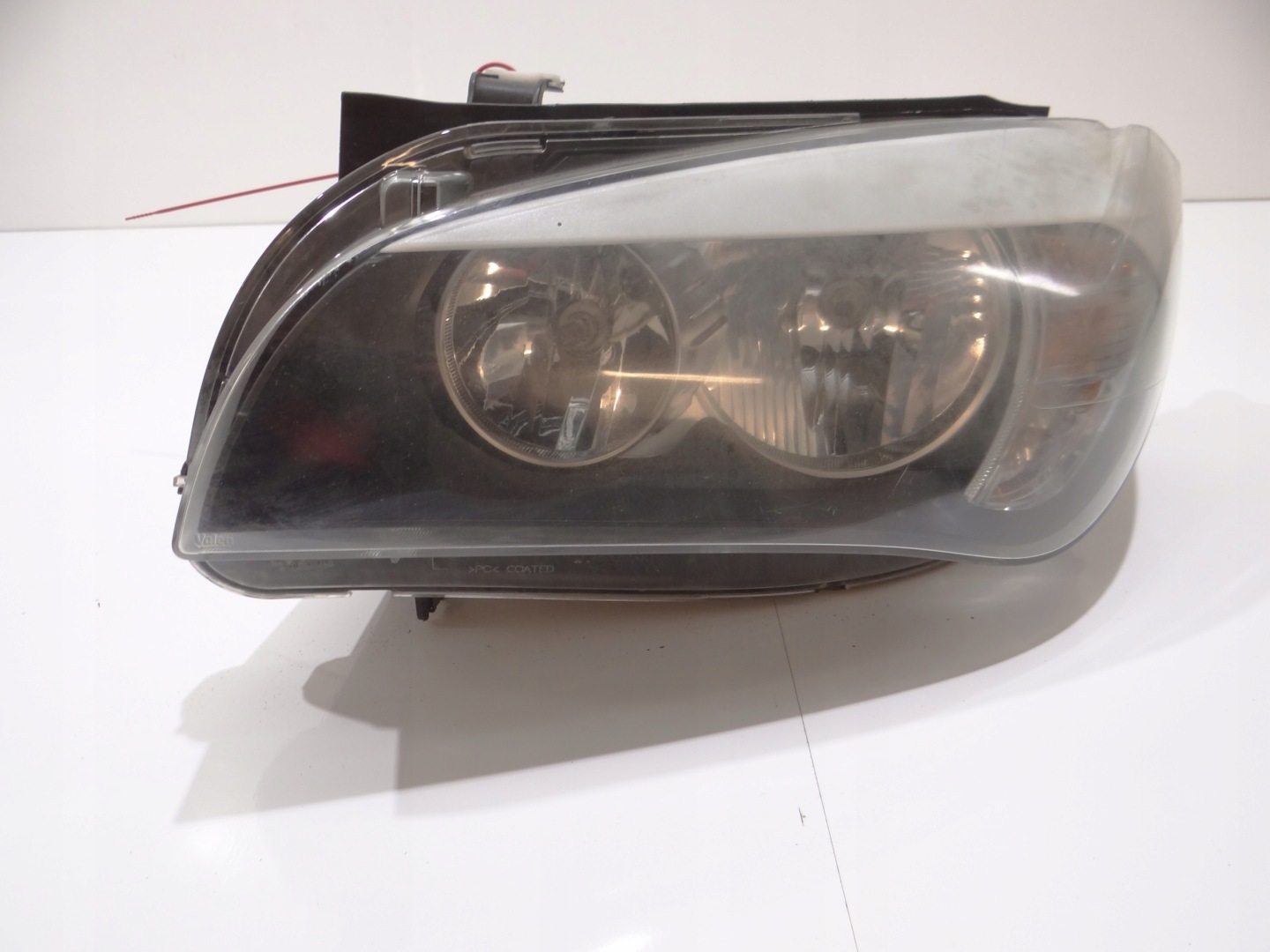 BMW X1 E84 light left front OE 2990003