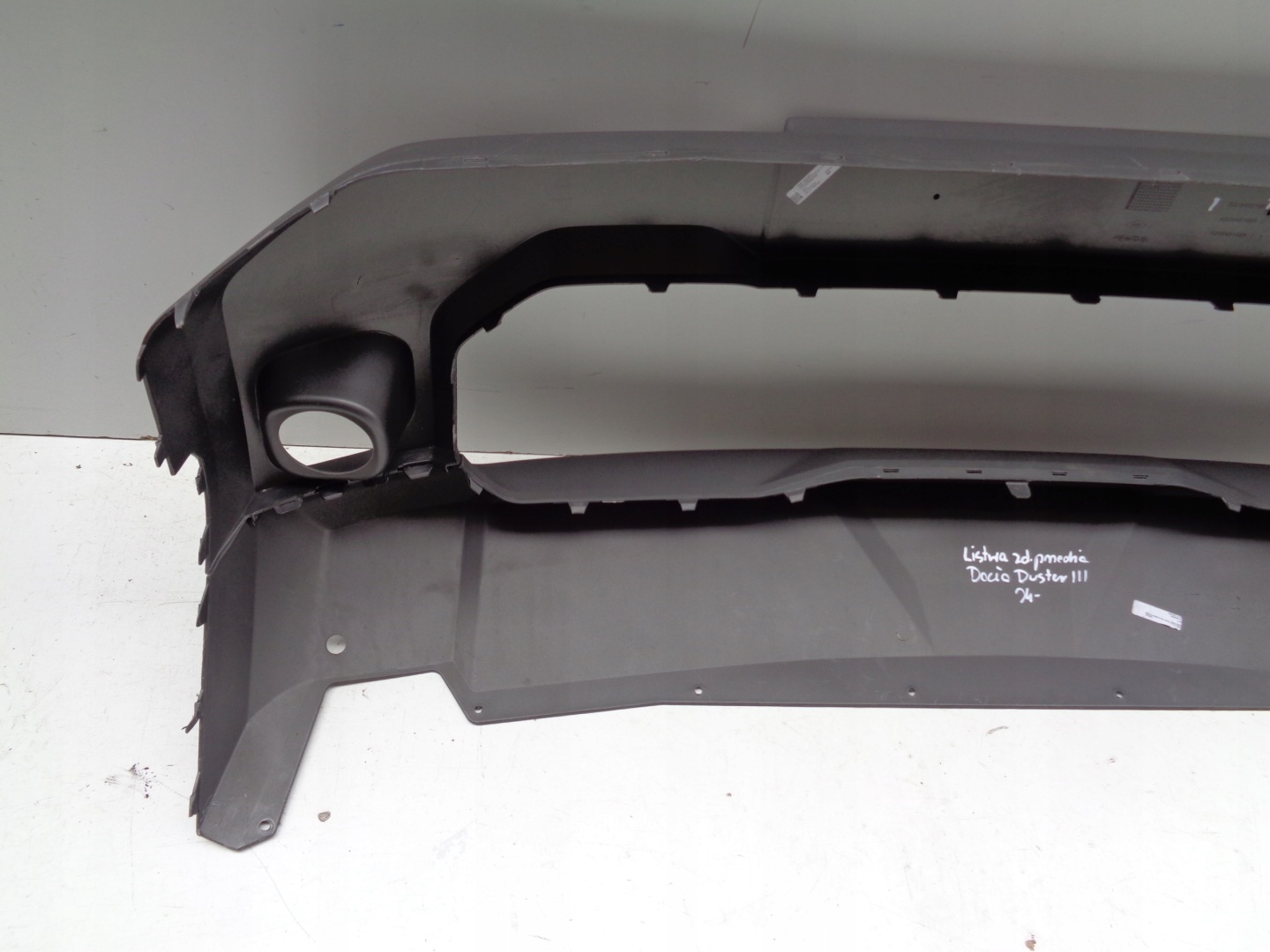 moulding of a bumper front lower cap DACIA DUSTER III 24
