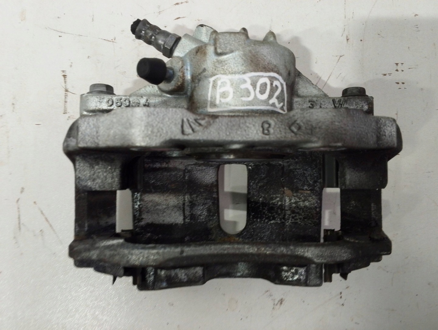 Opel Corsa F caliper front left L94124 (B302)