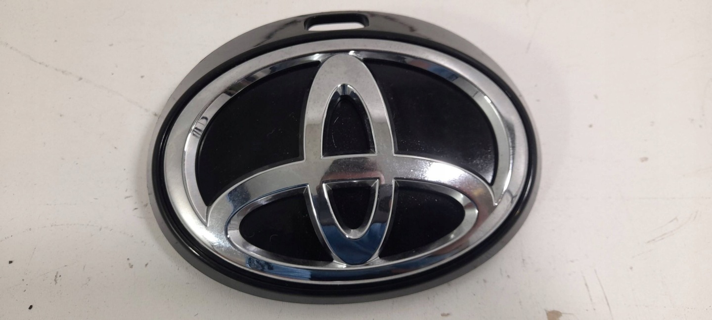 Toyota Corolla E21 Hatchback Logo per posteriore klape 6793002060 (ZN4)