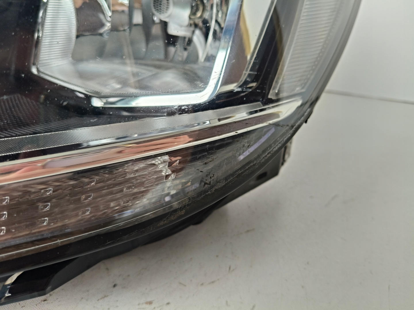 light left REFLEKTOR VW TOURAN 5TA 16
