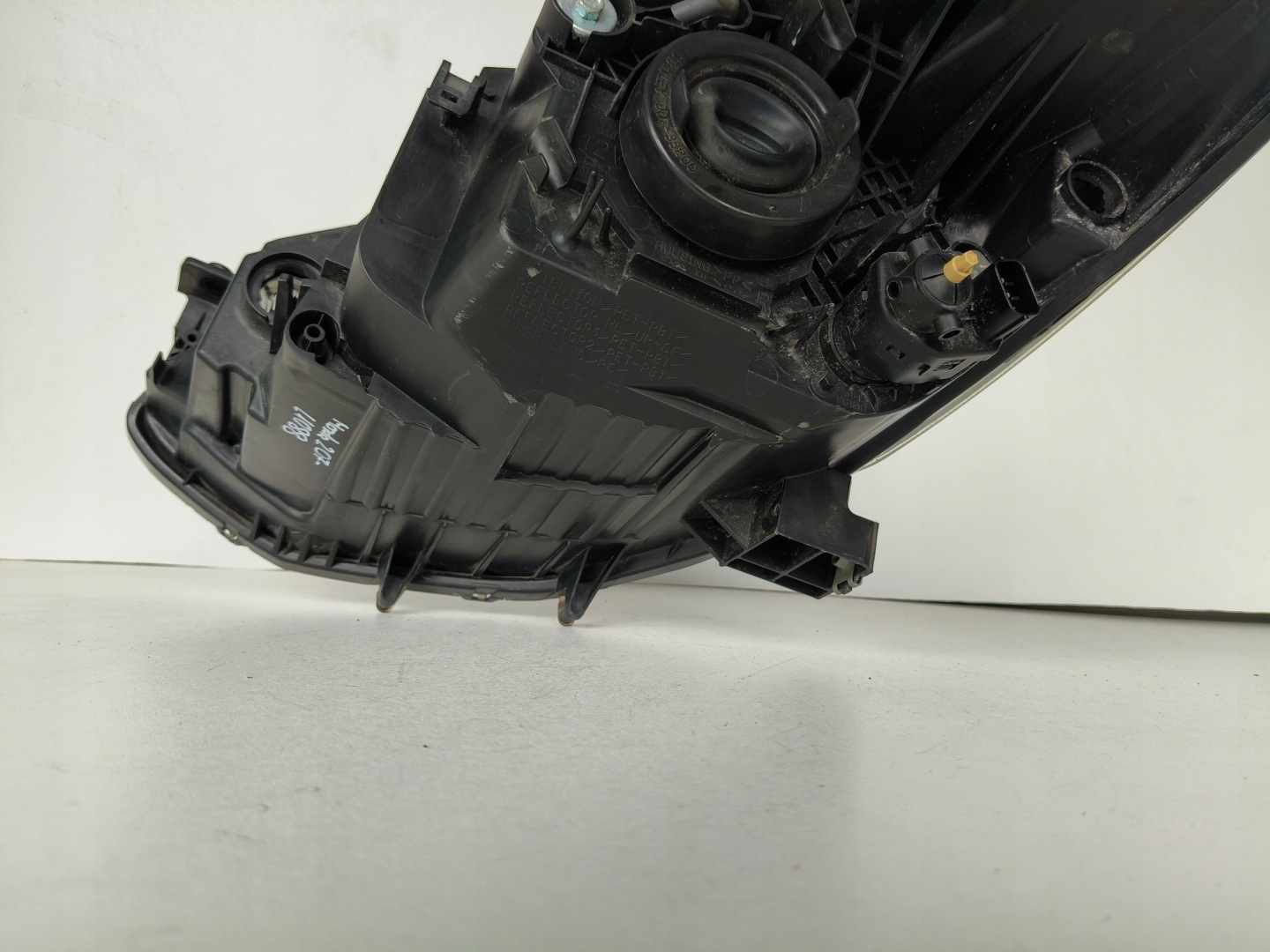 light right REFLEKTOR MAZDA 2 07