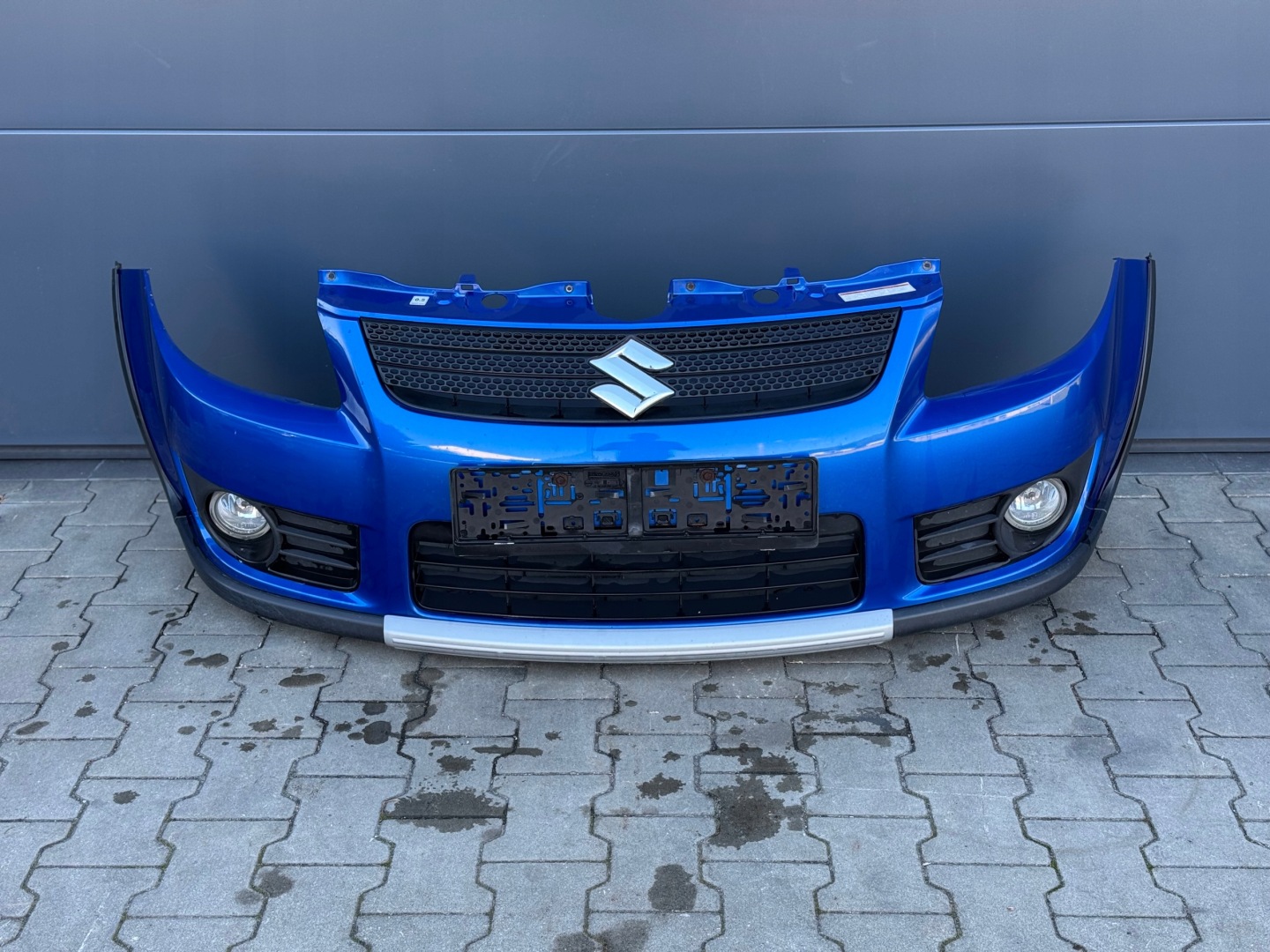 SUZUKI SX4 06R- bumper front front SX4 SX-4 original blue !