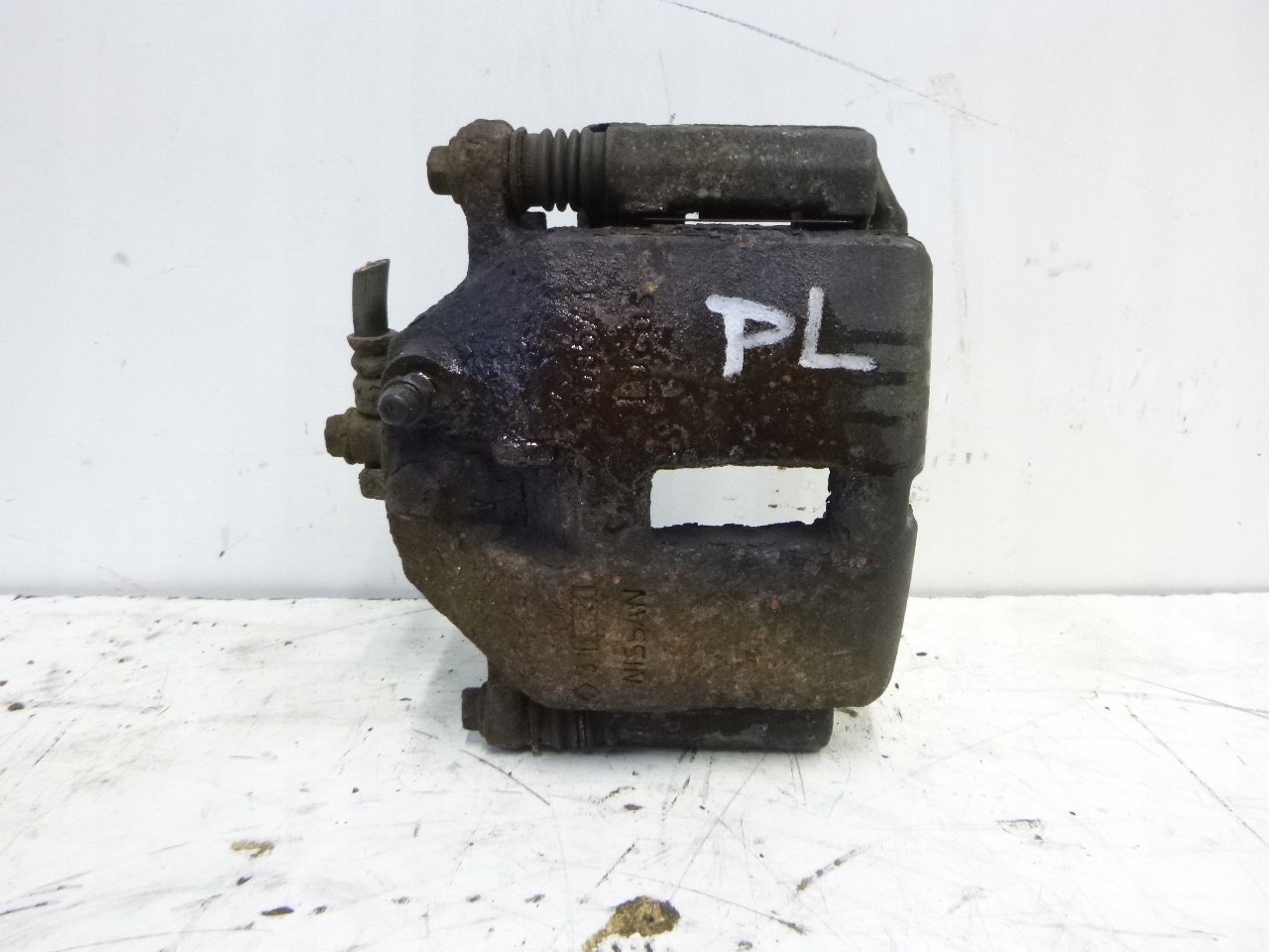 caliper brake front left Nissan Primera P12 1.8 02-07r.