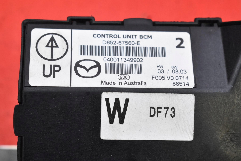 Unité commande confort D652-67560-E MAZDA 2 II DE 1.3 16V 75 KM 07-10