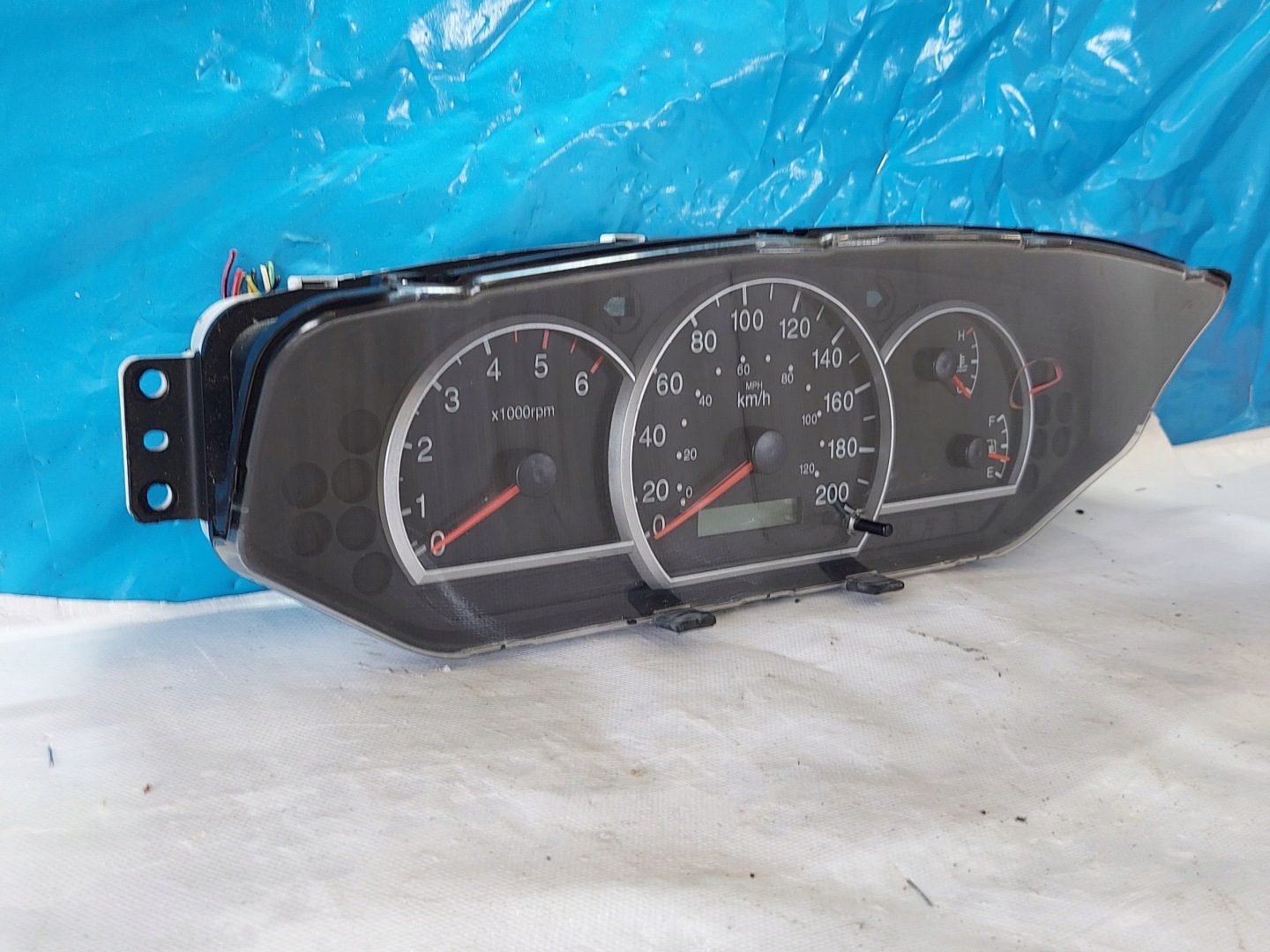 dials clock KIA CARENS II 2.0 CRDI 0K2KC55430A