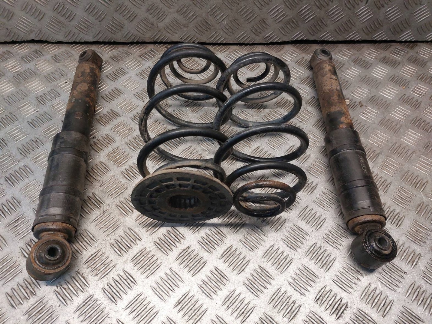 shock absorber + spring left rear part + right rear part OPEL ASTRA H 22214571